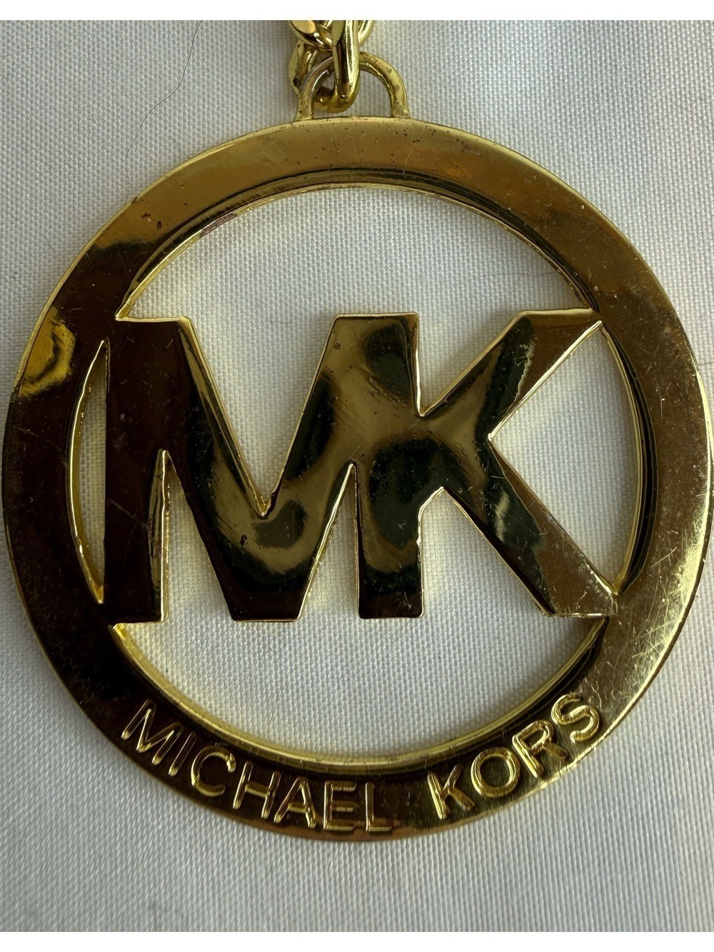 MICHAEL KORS MK LOGO CIRCULAR BAG CHARM AND KEY FOB